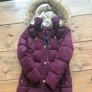 Women’s Nautical burgundy puffer coat.